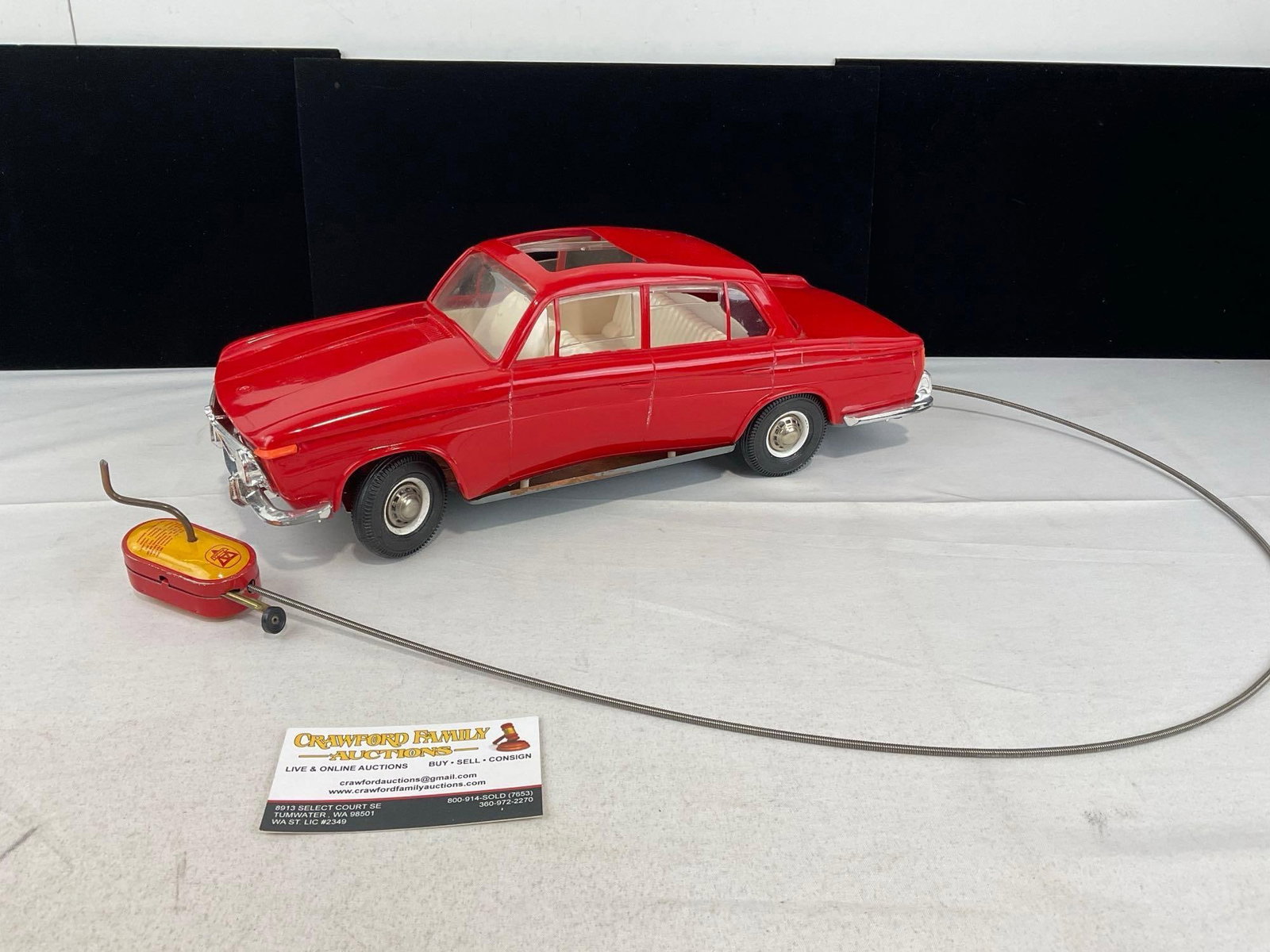Vintage 1950s Arnold BMW 1500 Toy Car, Red Plastic & Sheet Metal, w/Cable controller, 6x16x7 inches: Has some bent molded plastic, the side, and the sunroof detail. See pics for condition. Measures approx 6h x 16w x 7d inches. E-6710