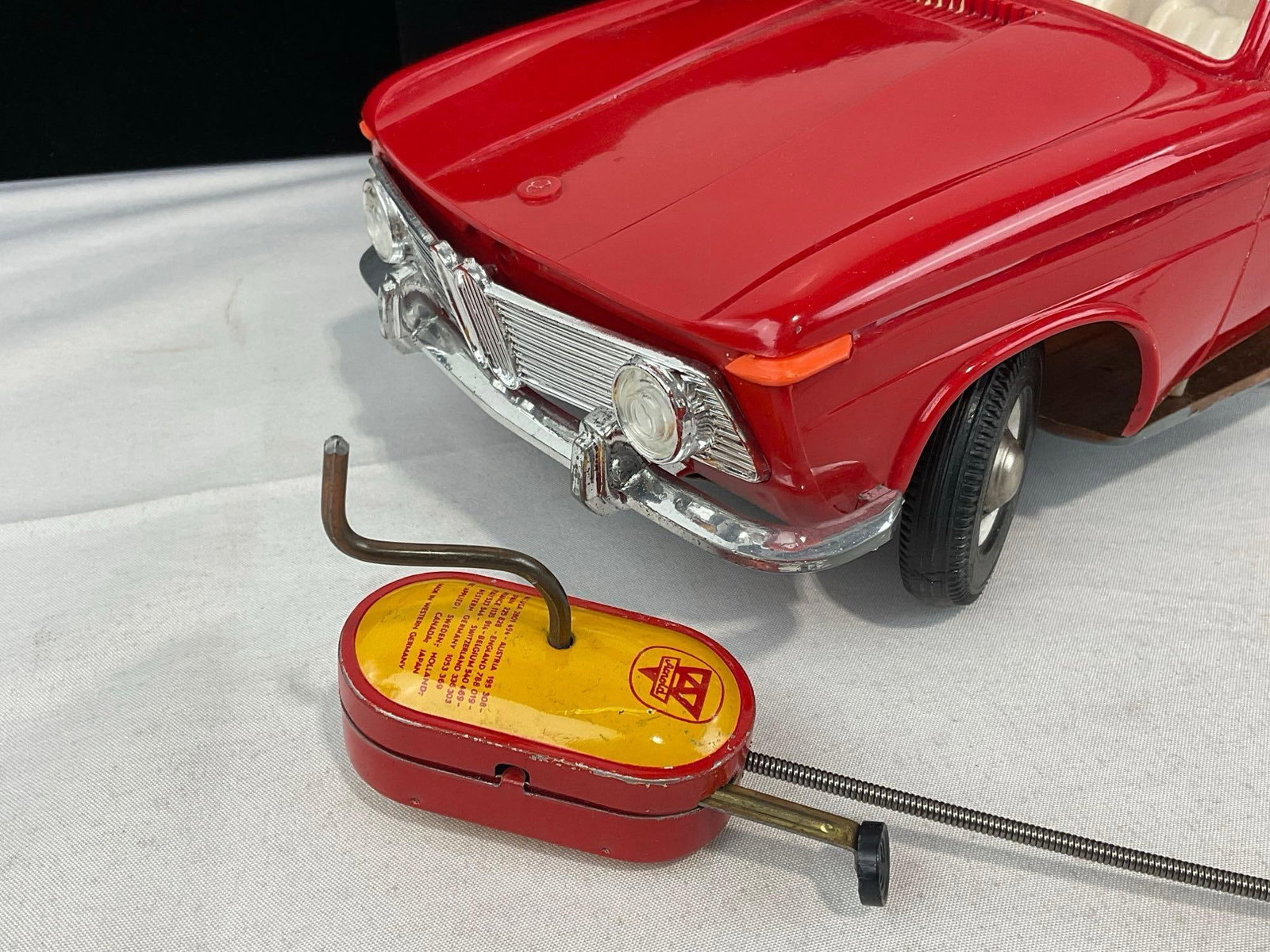 Vintage 1950s Arnold BMW 1500 Toy Car, Red Plastic & Sheet Metal, w/Cable controller, 6x16x7 inches - 2