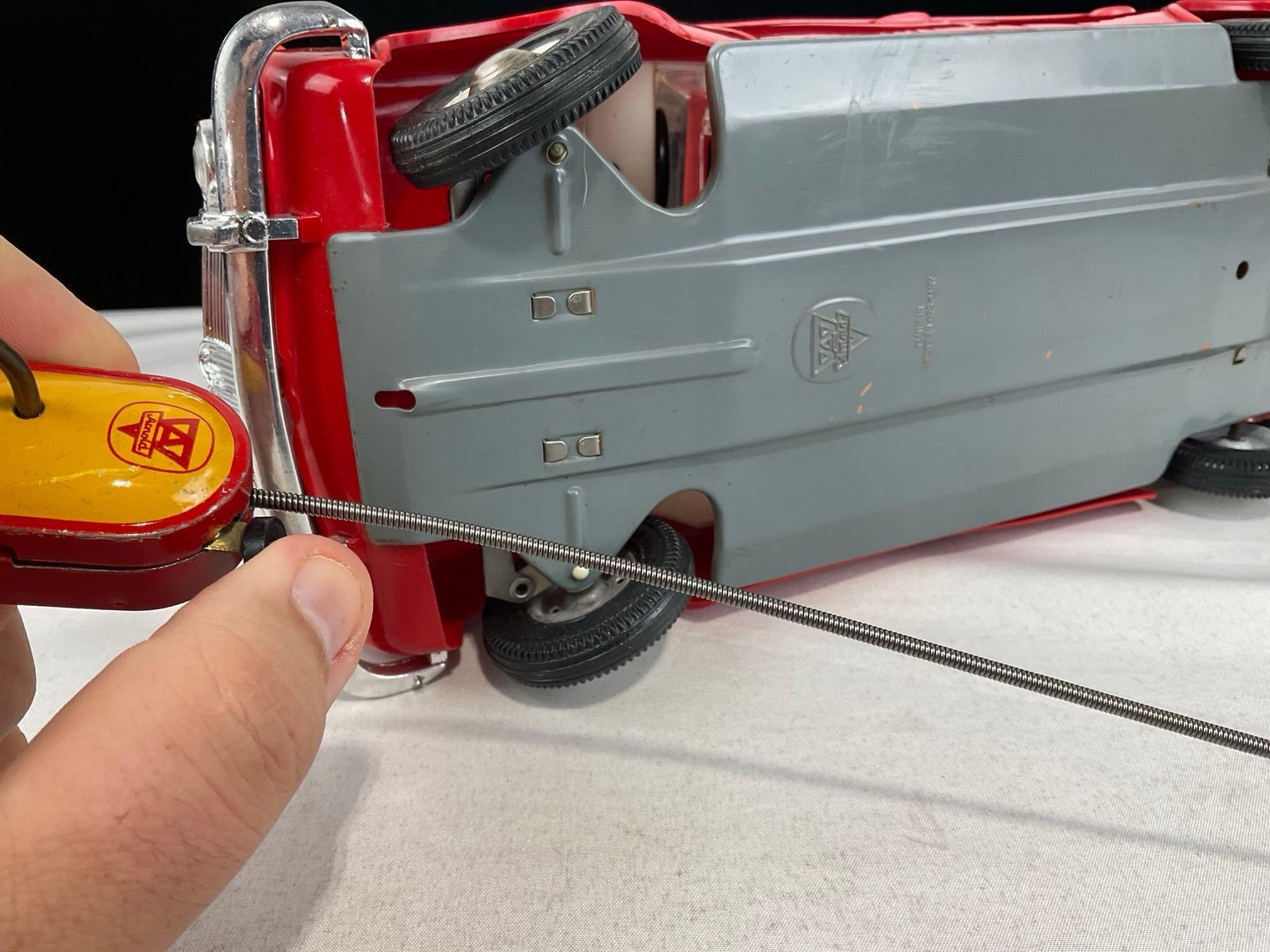 Vintage 1950s Arnold BMW 1500 Toy Car, Red Plastic & Sheet Metal, w/Cable controller, 6x16x7 inches - 5