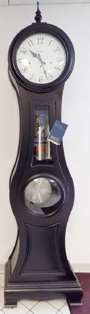 HOWARD MILLER GRANDFATHER CLOCK: A BRAND NEW HOWARD MILLER BLACK GRANDFATHER CLOCK MODEL NUMBER 611-126. MEASURES 88.5"H X 24"W X 13.25"D.