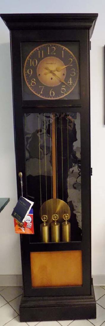 HOWARD MILLER FLOOR CLOCK: A DISCONTINUED HOWARD MILLER FLOOR CLOCK MODEL 611-096. THIS CLOCK IS BRAND NEW AND IN EXCELLENT CONDITION. MEASURES 78"H X 22.5"W X 13.75"D.