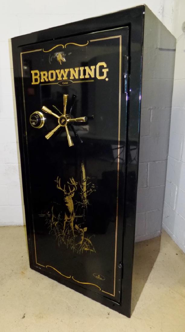 BROWNING GUN SAFE: A LARGE BROWNING GOLD HUNTER GREEN GUN SAFE. MEASURES 29"H X 29"D X 60"H.
