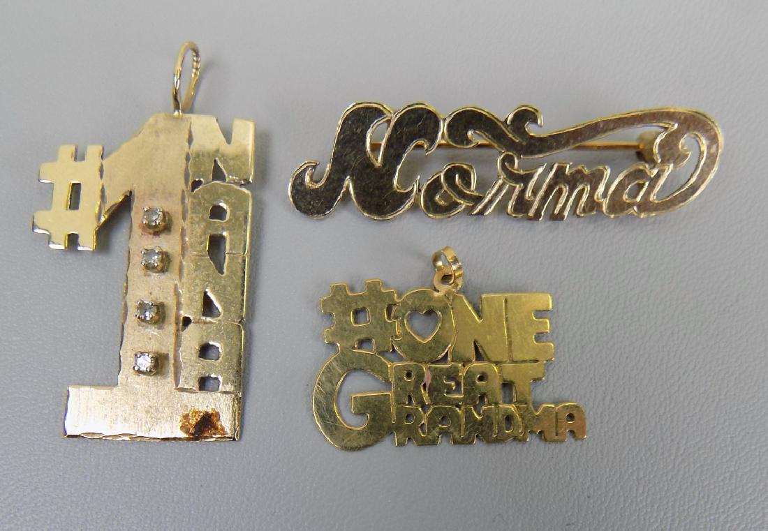 GOLD CHARMS AND A PIN (1 of 5)