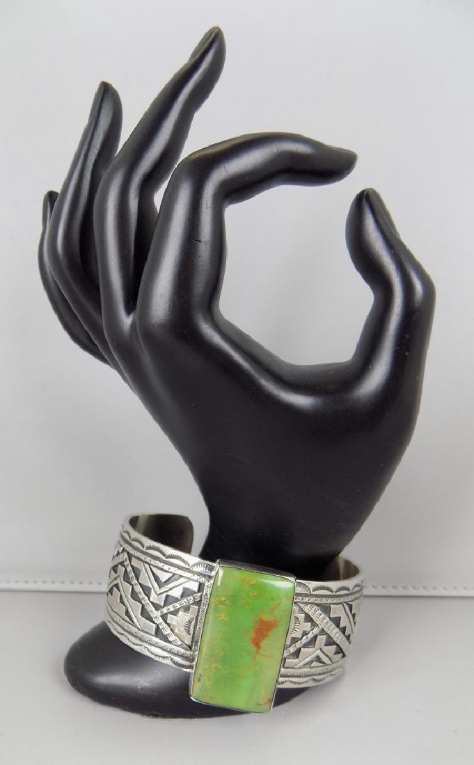 S-WESTERN STERLING & SQ GREEN TURQ. CUFF BRACELET: SIGNED STERLING & PETER NELSON, SIZE 7-1/2" AND 1" WIDE.