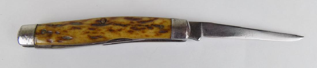 REMINGTON STAG FOLDING POCKET KNIFE: SPEAR AND PEN BLADES. 3-3/4" CLOSED, 6-3/4" OPEN.