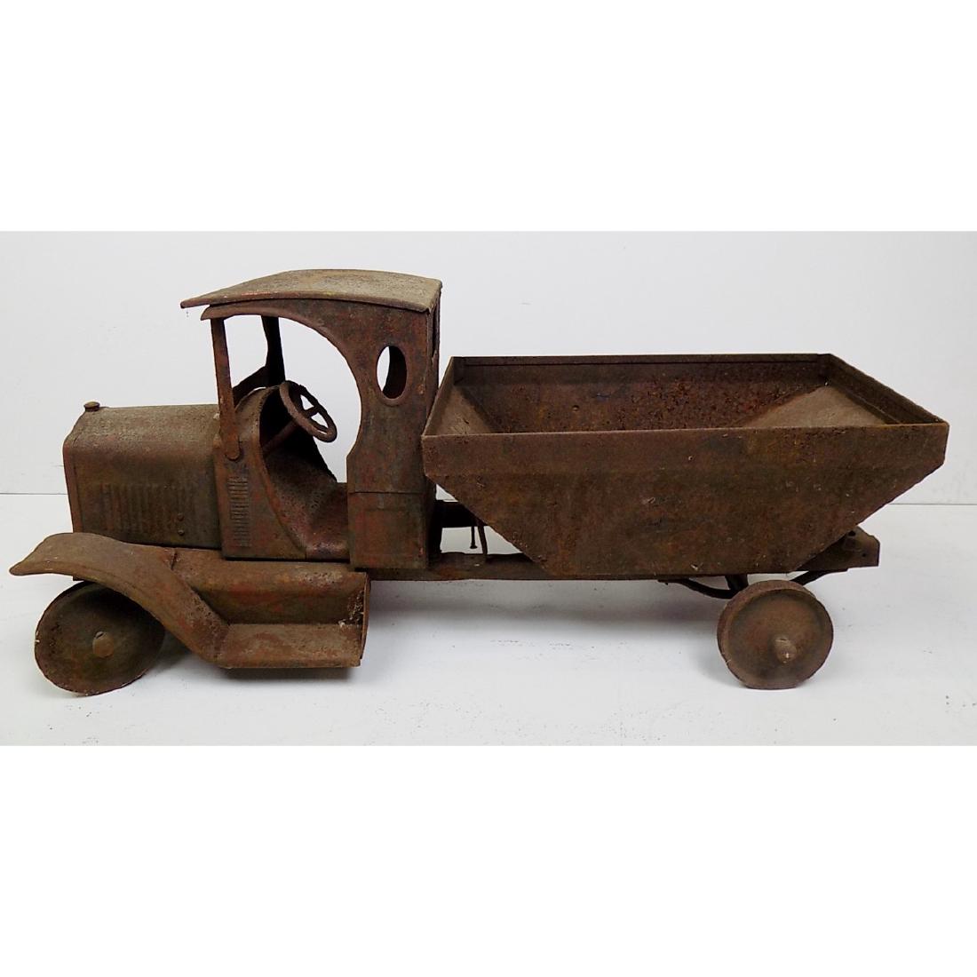 "C" CAB TRUCK CHASSIS & BUDDY L COAL BODY: BODY IS BUDDY "L", NOT ATTACHED. SOME ORIGINAL PAINT. 9" WIDE BY 25-1/2" LONG AND 10-1/2" HIGH. NO RUBBER ON THE WHEELS.