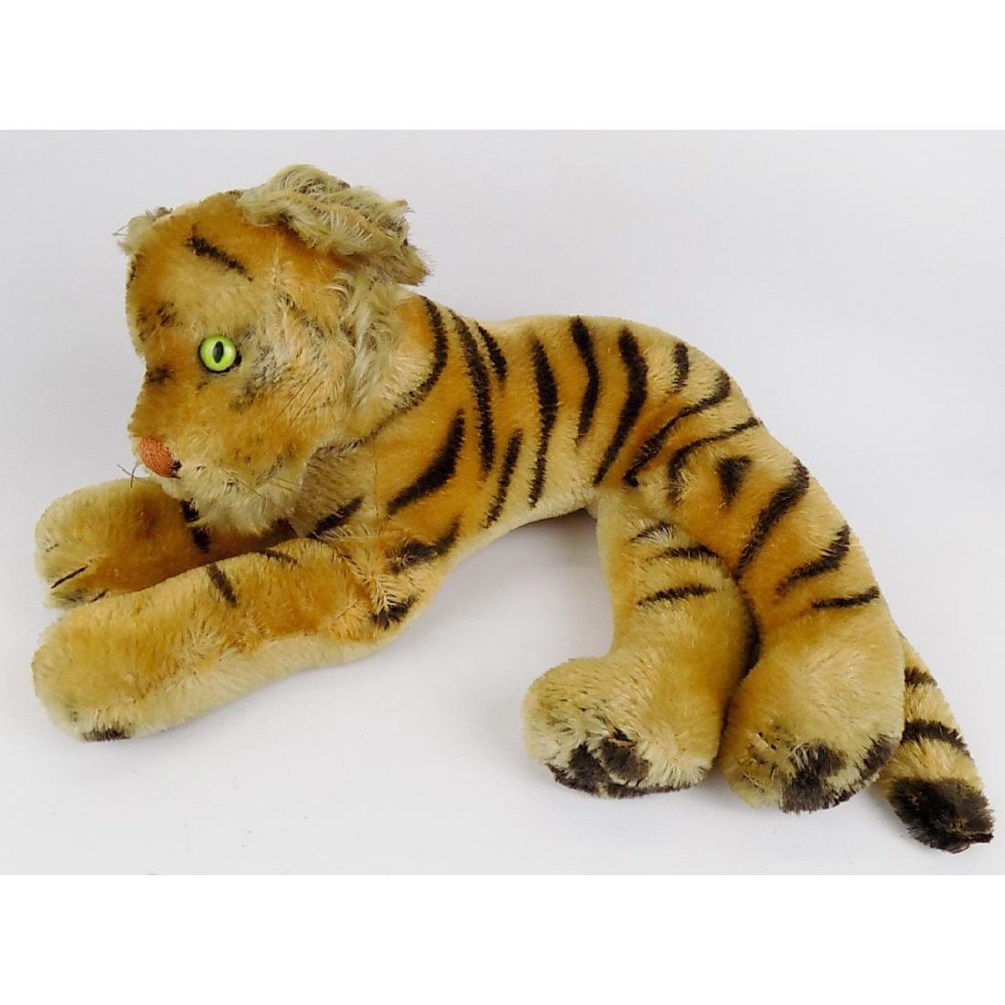STEIFF MOHAIR TIGER: WITH HANG TAG BUT NO BUTTON. 14-1/2" LONG, 7-1/2" HIGH.