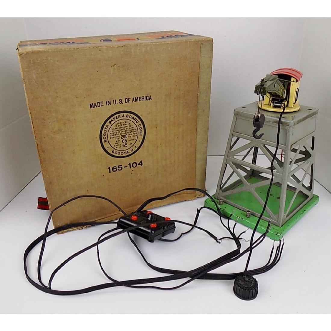 LIONEL REMOTE CONTROL CRANE #165 IN BOX: WITH CONTROLLER. ORIGINAL BOX. 10-1/2" HIGH.