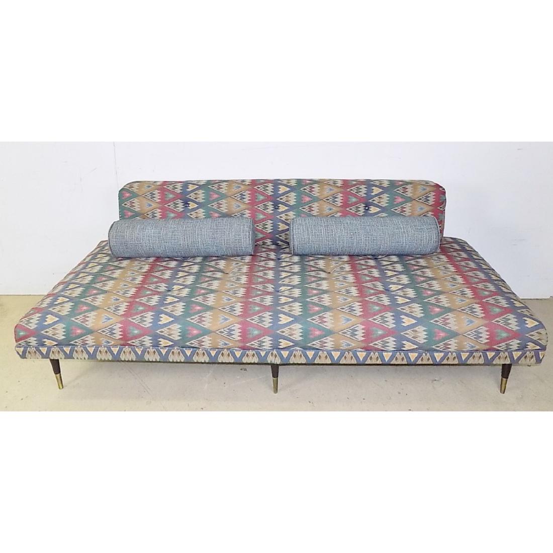 MID CENTURY SOFA: A PATTERN UPHOLSTERED MID CENTURY SOFA WITH TWO THROW PILLOWS. PROFESSIONALLY REUPHOLSTERED. MEASURES 75"L X 26"H X 31"D.
