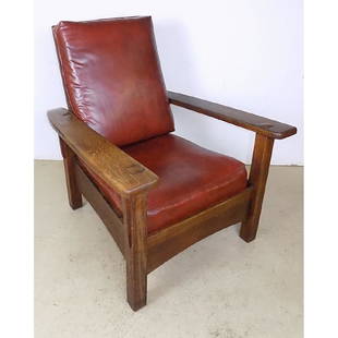 SIGNED OAK MORRIS CHAIR: ASIGNED LAMBERT'S ARTS AND CRAFTS OAK MORRIS CHAIR. MFG IN GRAND RAPIDS AND HOLLAND. MEASURES 31"W X 39"D X 36"H. CHAIR HEIGHT IS 16".