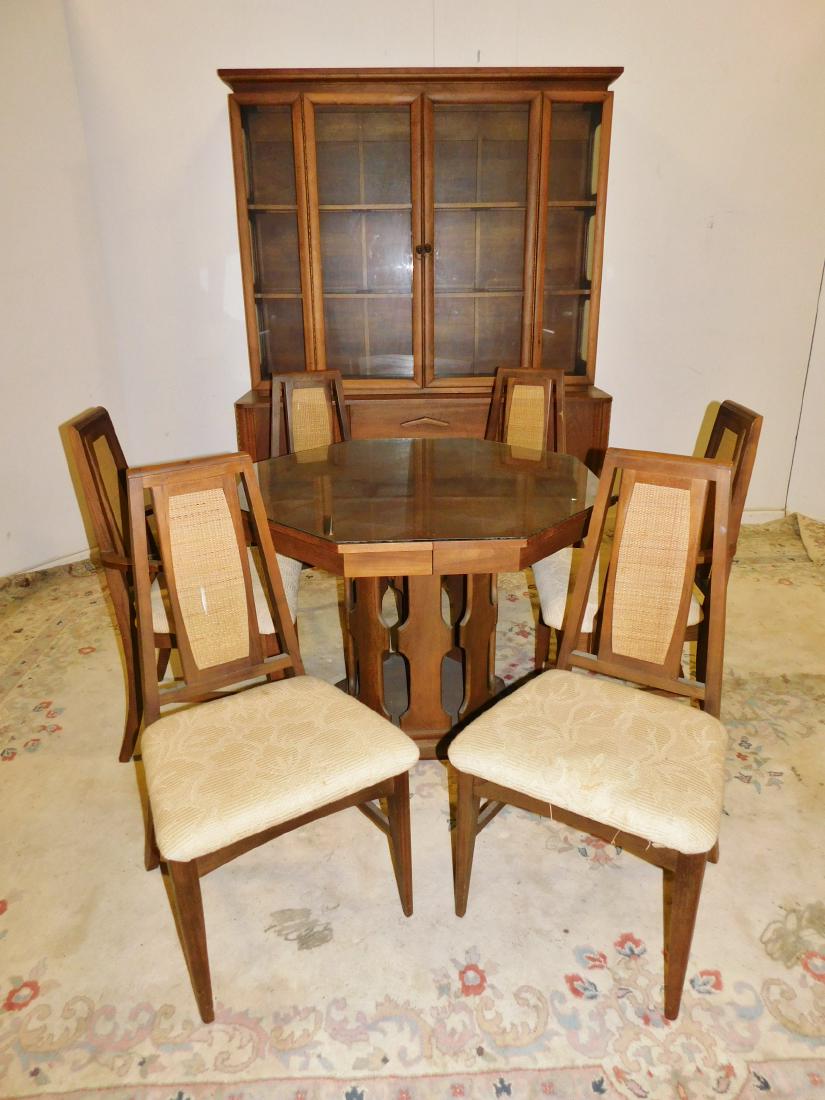 PECK AND HILLS MID CENTURY DINING SET: A 8 PIECE PECK AD HILLS MID CENTURY DINING ROOM SET INCLUDES SIX SIDE CHAIRS, OCTAGON TABLE WITH GLASS, AND TWO PIECE HUTCH. HUTCH MEASURES 64"W X 81"H. TABLE MEASURES 40"D X 30".