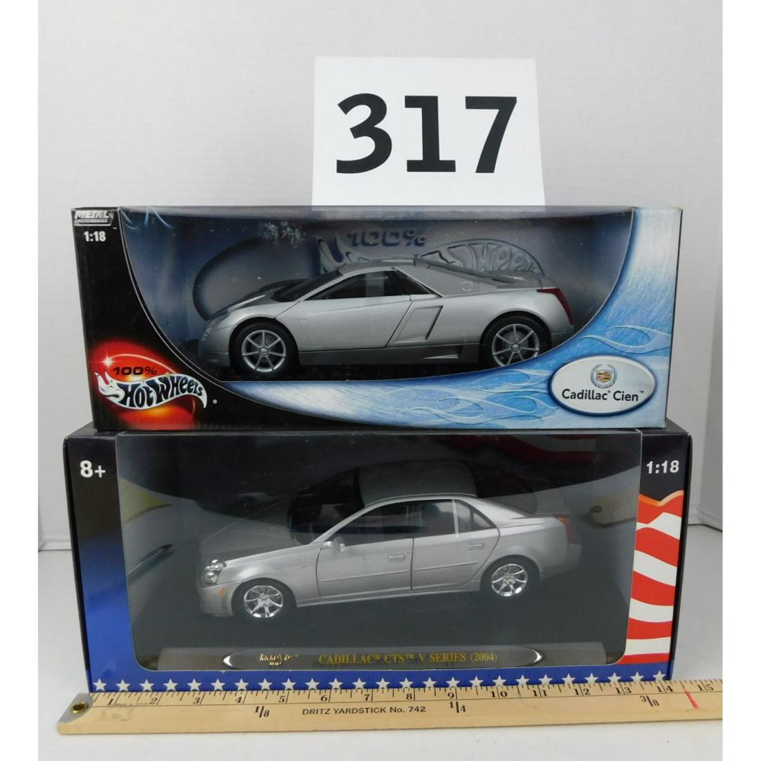LOT OF TWO MODEL CADILLAC CARS: A LOT OF TWO CADILLAC SCALE MODEL CARS. ONE HOT WHEELS CADILLAC CIEN AND ONE RICKO 2004 CADILLAC CTS V SERIES. STILL IN THE ORIGINAL BOXES.