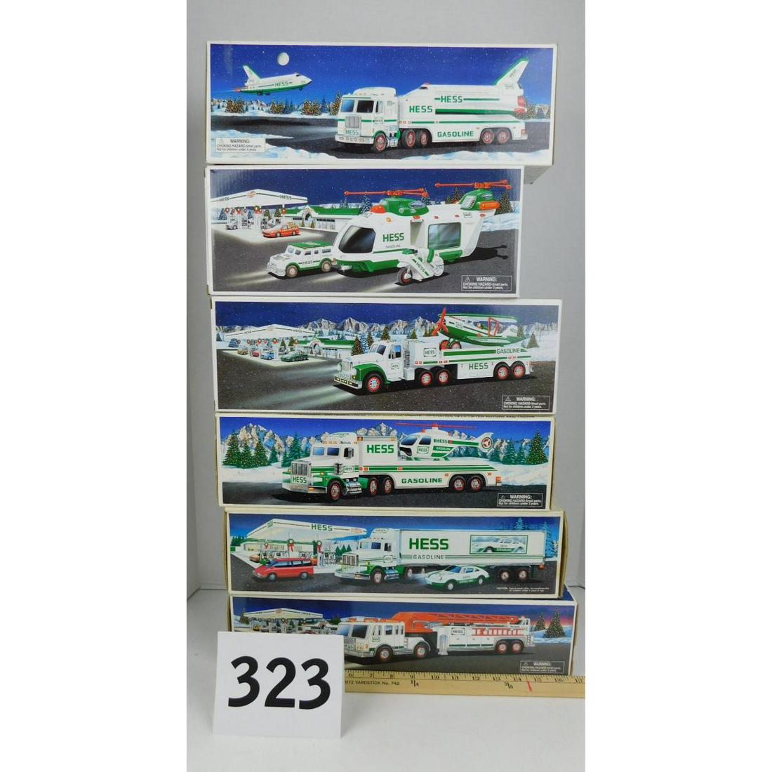 LOT OF SIX HESS TRUCKS: A LOT OF SIX STILL IN BOX HESS TRUCKS. YEARS 1992, 1995, 1999, 2000, 2002, AND 2012.