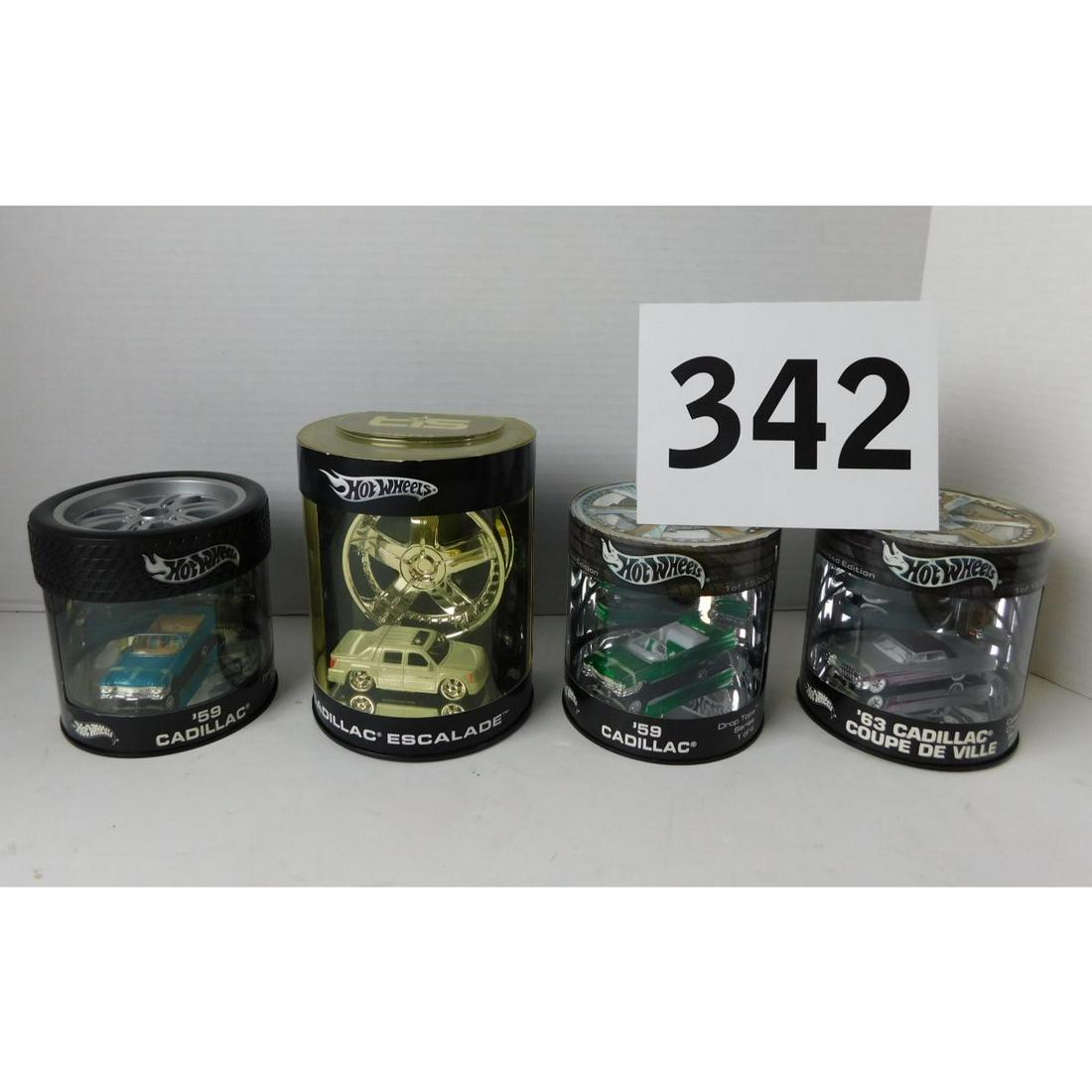 HOT WHEELS CADILLAC TOY CARS: A LOT OF FOUR HOT WHEELS CADILLAC TOY CAR SETS. PLEASE SEE PHOTOGRAPHS.