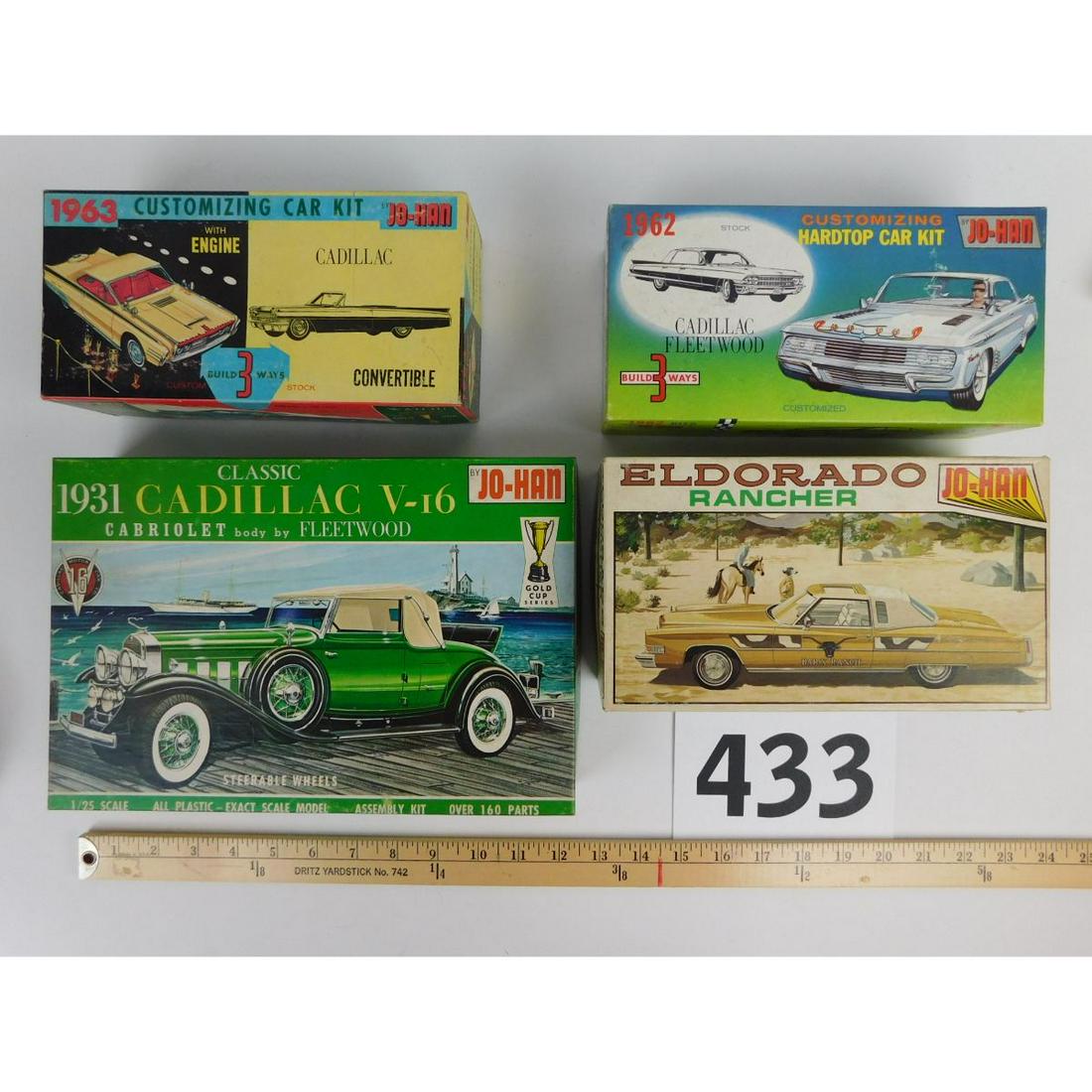 VINTAGE JO-HAN CADILLAC CAR KITS: A LOT OF FOUR VINTAGE JO-HAN CADILLAC MODEL CAR KITS IN THE ORIGINAL BOXES.