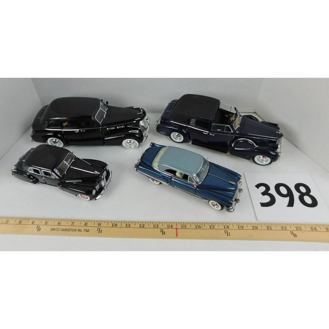 ASSORTED CADILLAC SCALE MODEL CARS: A LOT OF ASSORTED CADILLAC SCALE MODEL CARS. NAMES LIKE JADA, DANBURY MINT, AND FRANKLIN MINT.