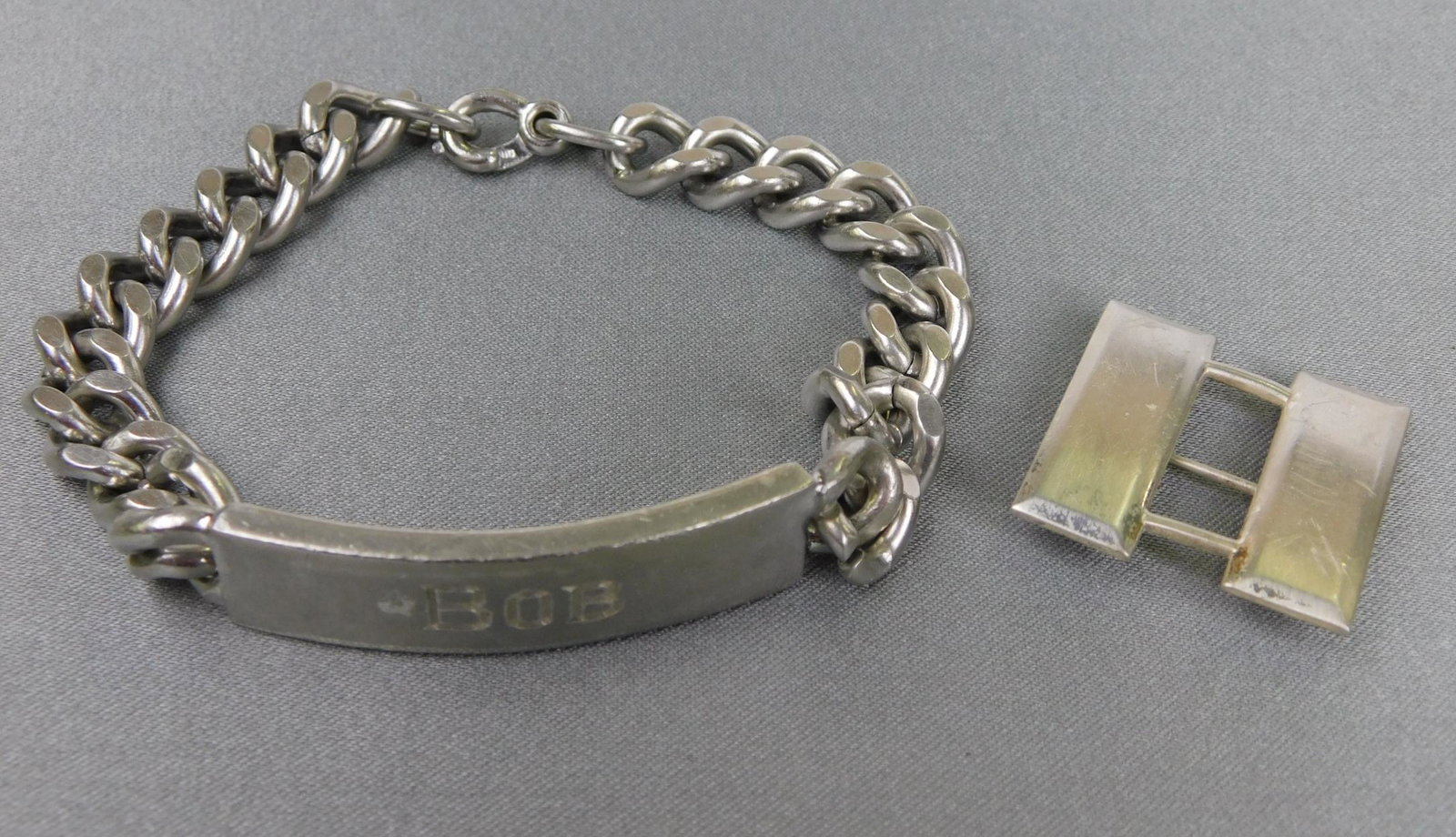 STERLING CHAIN BRACELET LOT: A STERLING SILVER CHAIN BRACELET LOT AND PIN. BRACELET MONOGRAMMED "BOB" ON FRONT AND "HONEY" ON BACK. TOTAL WEIGHT IS 57.3 GRAMS.