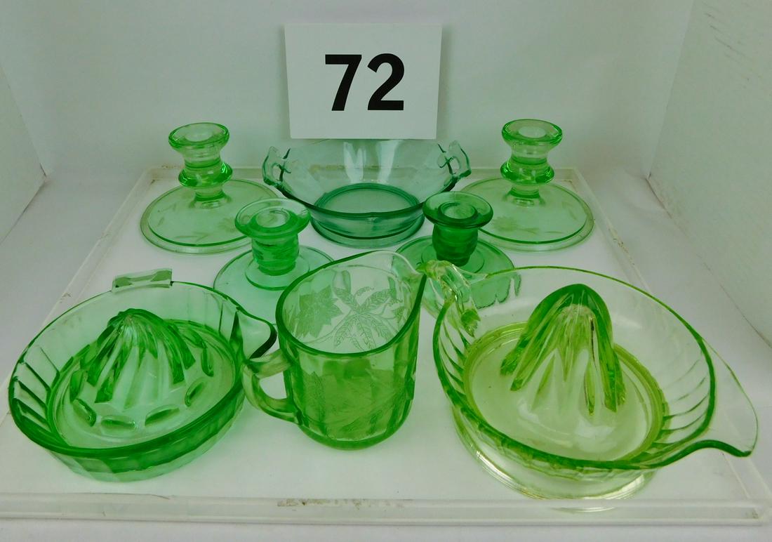 GREEN DEPRESSION GLASS LOT: A LOT OF GREEN DEPRESSION GLASS INCLUDING PITCHER, TWO JUICERS, CANDLESTICKS AND BOWL.