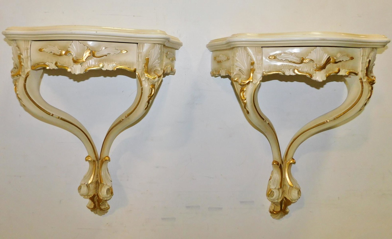 PR MARBLE TOP FRENCH PROVINCIAL WALL SHELVES: A PAIR OF FRENCH PROVINCIAL STYLE WALL SHELVES DECORATED WITH GOLD GILT PAINT AND MARBLE INSERTS. MEASURES 21"W X 12"D X 25"H.