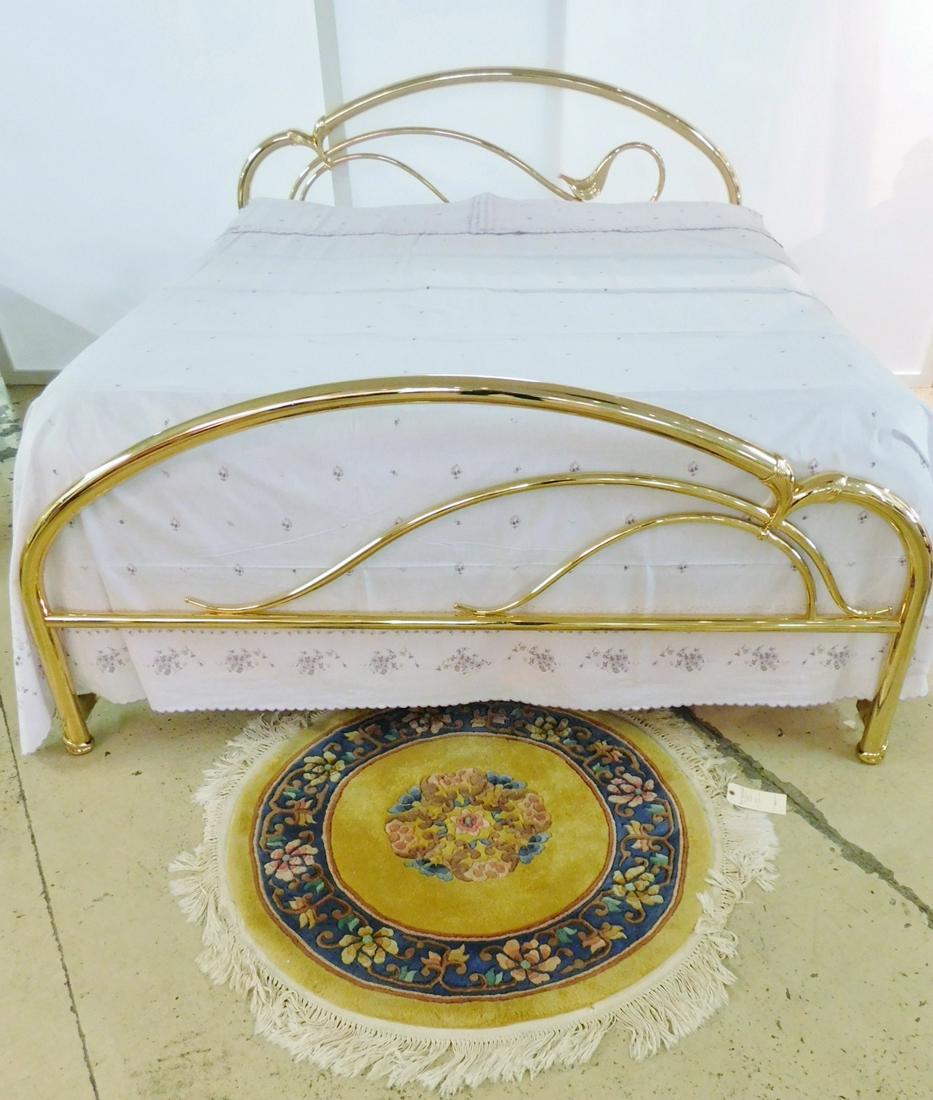 QUEEN SIZED POLISHED BRASS BED.: A QUEEN SIZED FIGURAL POLISHED BRASS BED. BEDDING IS INCLUDED IN THIS LOT IF THE BUYER SO WISHES.
