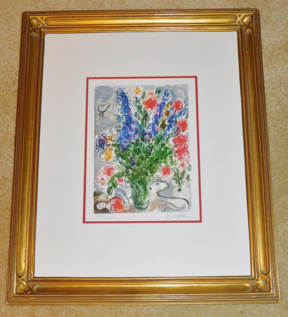 LIMITED EDITION MARC CHAGALL PRINT: A HAND SIGNED AND NUMBERED MARC CHAGALL FLORAL LITHOGRAPH. MEASURES 24" X 20" WITH FRAME.