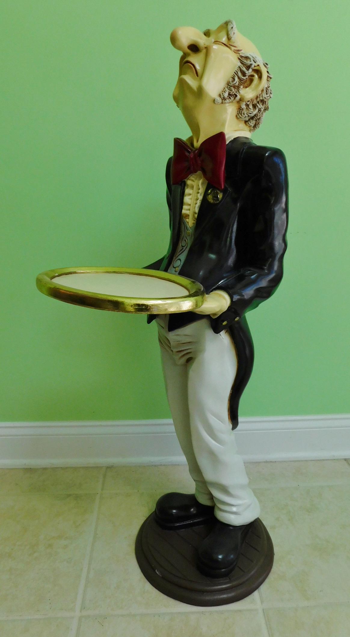 35" COMPOSITE BUTLER STATUE: A 35" TALL COMPOSITE BUTLER STATUE COMPLETE WITH SERVING TRAY.