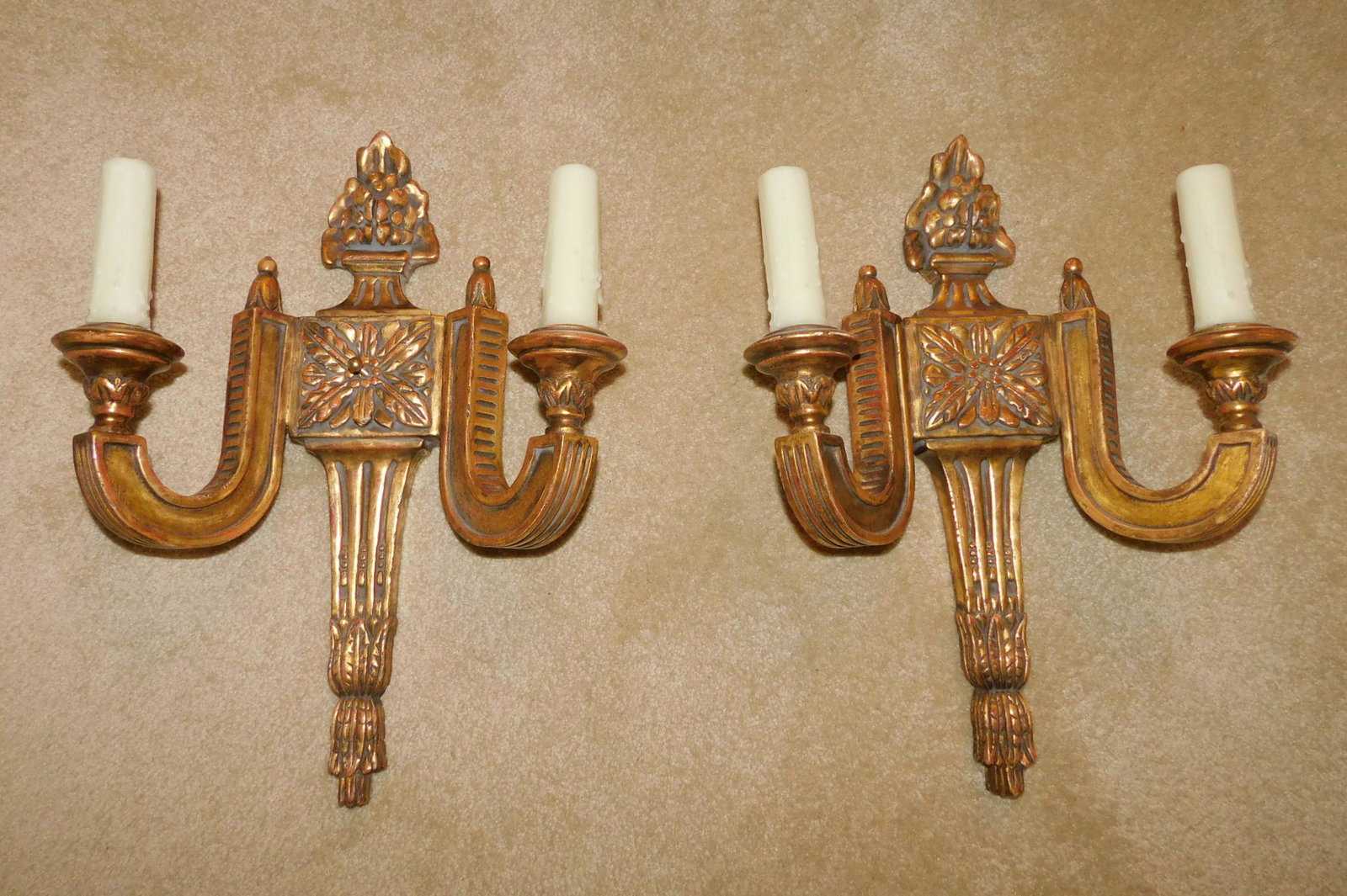 COMPOSITE GILT WALL SCONCES: A PAIR OF COMPOSITE GOLD GILT WALL SCONCES. MEASURES 17"H X 13"W.