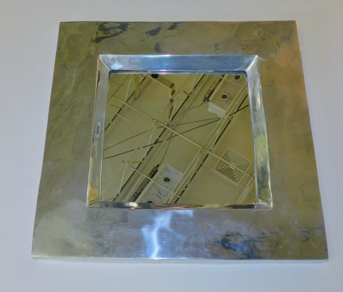 MODERN CHROME MIRROR: A MODERN CHOME MIRROR. MEASURES 22" SQUARE