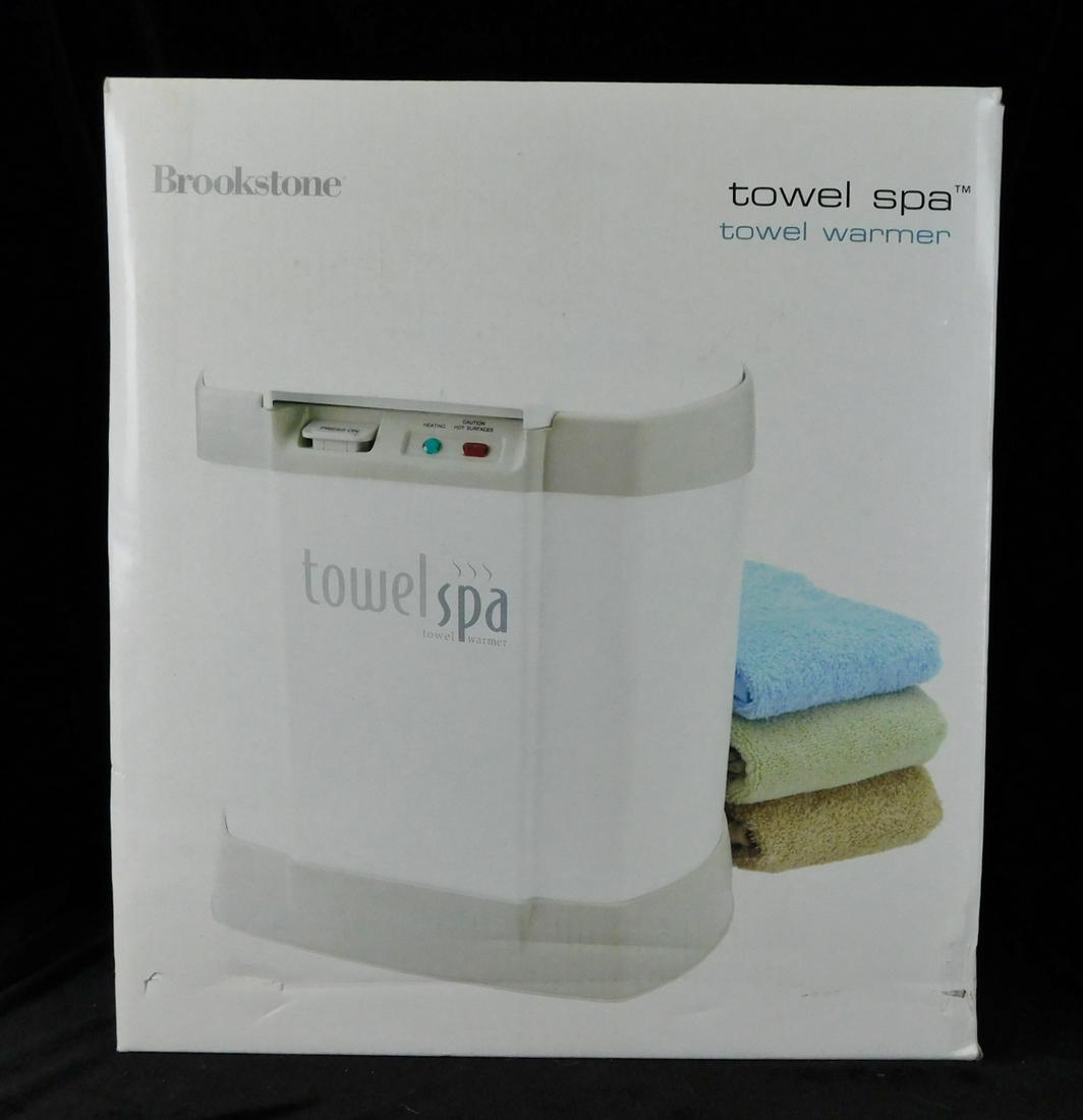 BROOKSTONE TOWEL SPA IN BOX: A BROOKSTONE TOWEL SPA IN BOX. BOX MEASURES 12" X 8.5" X 13"H.