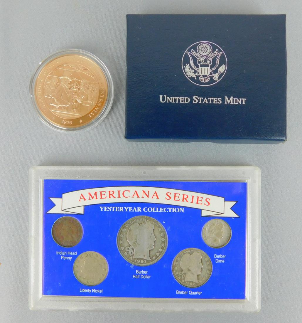 COIN AND COIN SET LOT: LOT INCLUDES AMERICANA SERIES YESTERYEAR COLLECTION COIN SET, ONE 2001 CAPITOL VISITOR CENTER SILVER DOLLAR WITH CERT, AND A 1876 CENTENNIAL EXPOSITION PROOF MEDAL. PLEASE SEE PHOTOGRAPHS.