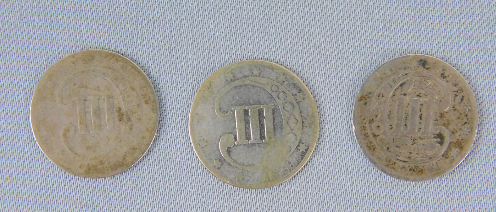 1850'S CENT SILVER PIECES: 1851, 1856, AND ONE DATE COULD NOT BE READ, CENT SILVER PIECES