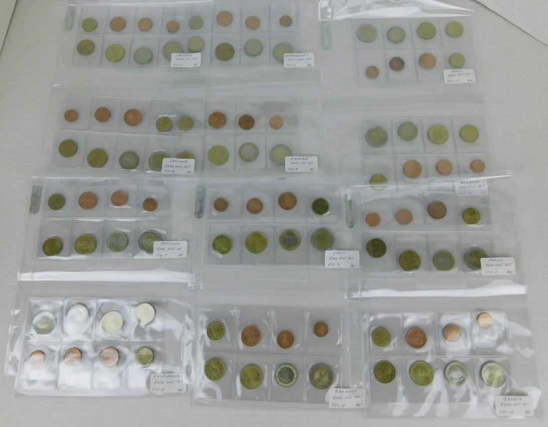 EURO MINT SETS: 8 COIN SETS FROM AUSTRIA, GERMANY, LUXEMBOURG, BELGIUM, GREECE, NETHERLANDS, FINLAND, IRELAND, PORTUGAL, FRANCE, ITALY & SPAIN