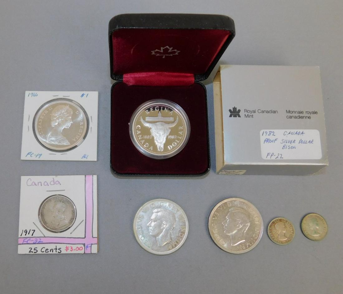 CANADIAN COINS: 1982 PROOF SILVER DOLLAR BISON; 1917 25 CENTS; 1939(2) $1 COINS; 1954(2) 10 CENT COINS & 1966 $1