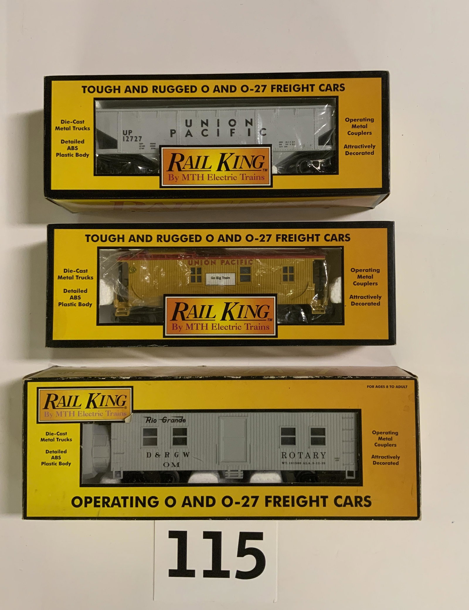THREE PIECE RAIL KING IN PACKAGE TRAIN CARS.: THREE PIECE RAIL KING IN PACKAGE TRAIN CARS. LOT INCLUDES 30-7710 UNION PACIFIC SEMI-SCALE CABOOSE, 30-7509 SEMI SCALE HOPPER CAR, AND 30-2123 D&RG ROTARY SNOW PLOW.
