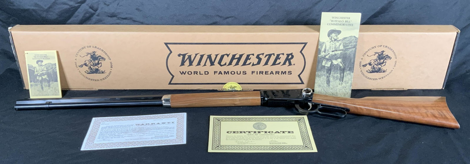 WINCHESTER MODEL 94 30-30 BUFFALO BILL COMMEMORATIVE LEVER ACTION RIFLE WITH ORIGINAL BOX AND: WINCHESTER MODEL 94 30-30 BUFFALO BILL COMMEMORATIVE LEVER ACTION RIFLE WITH ORIGINAL BOX AND PAPERS. SERIAL NUMBER WC42356. THIS FIREARM NEEDS TO BE REGISTERED.