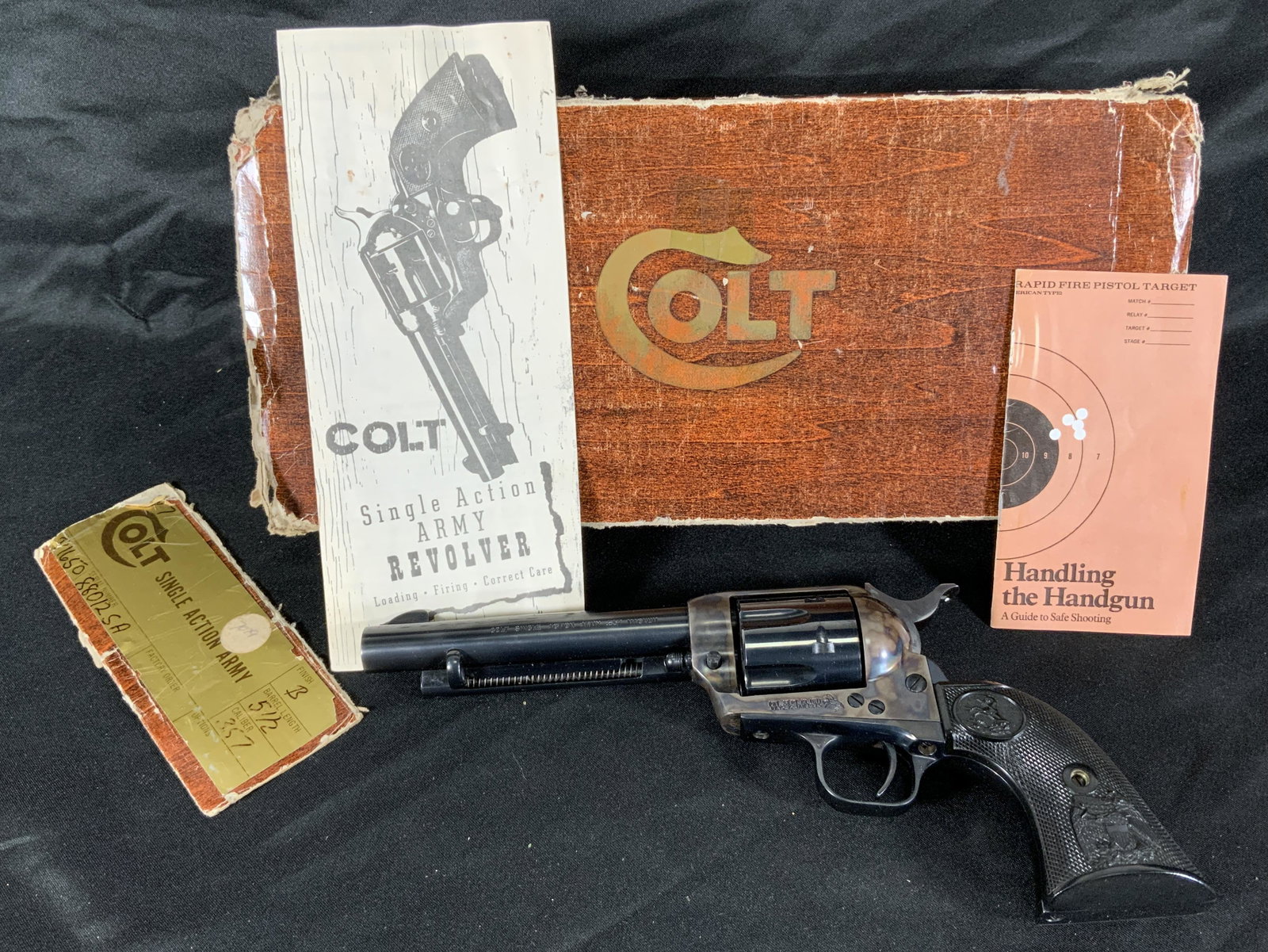 COLT SINGLE ACTION ARMY 357 REVOLVER WITH DECORATED GRIPS.: COLT SINGLE ACTION ARMY 357 REVOLVER WITH DECORATED GRIPS. SERIAL NUMBER 88012SA. THIS FIREARM NEEDS TO BE REGISTERED.