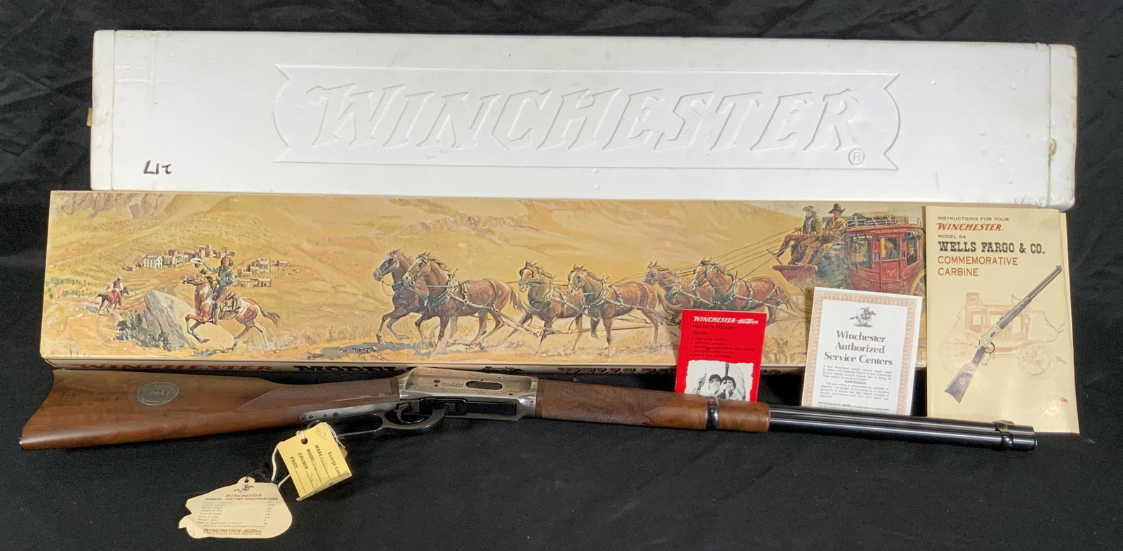 WINCHESTER MODEL 94 WELLS FARGO AND CO. COMMEMORATIVE 30-30 WIN LEVER ACTION CARBINE RIFLE: WINCHESTER MODEL 94 WELLS FARGO AND CO. COMMEMORATIVE 30-30 WIN LEVER ACTION CARBINE RIFLE. WITH ORIGINAL BOX AND PAPERWORK. SERIAL NUMBER WFC07820. THIS FIREARM NEEDS TO BE REGISTERED.