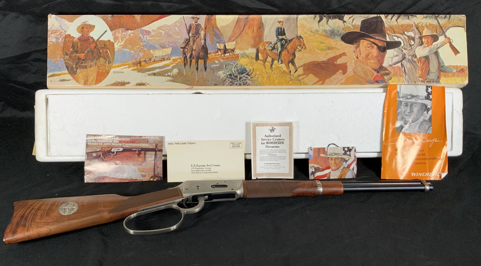 WINCHESTER MODEL 94 JOHN WAYNE COMMEMORATIVE 32-40 WIN LEVER ACTION RIFLE: WINCHESTER MODEL 94 JOHN WAYNE COMMEMORATIVE 32-40 WIN LEVER ACTION RIFLE WITH ORIGINAL BOX AND PAPERS. SERIAL NUMBER JW20689. THIS FIREARM NEEDS TO BE REGISTERED.
