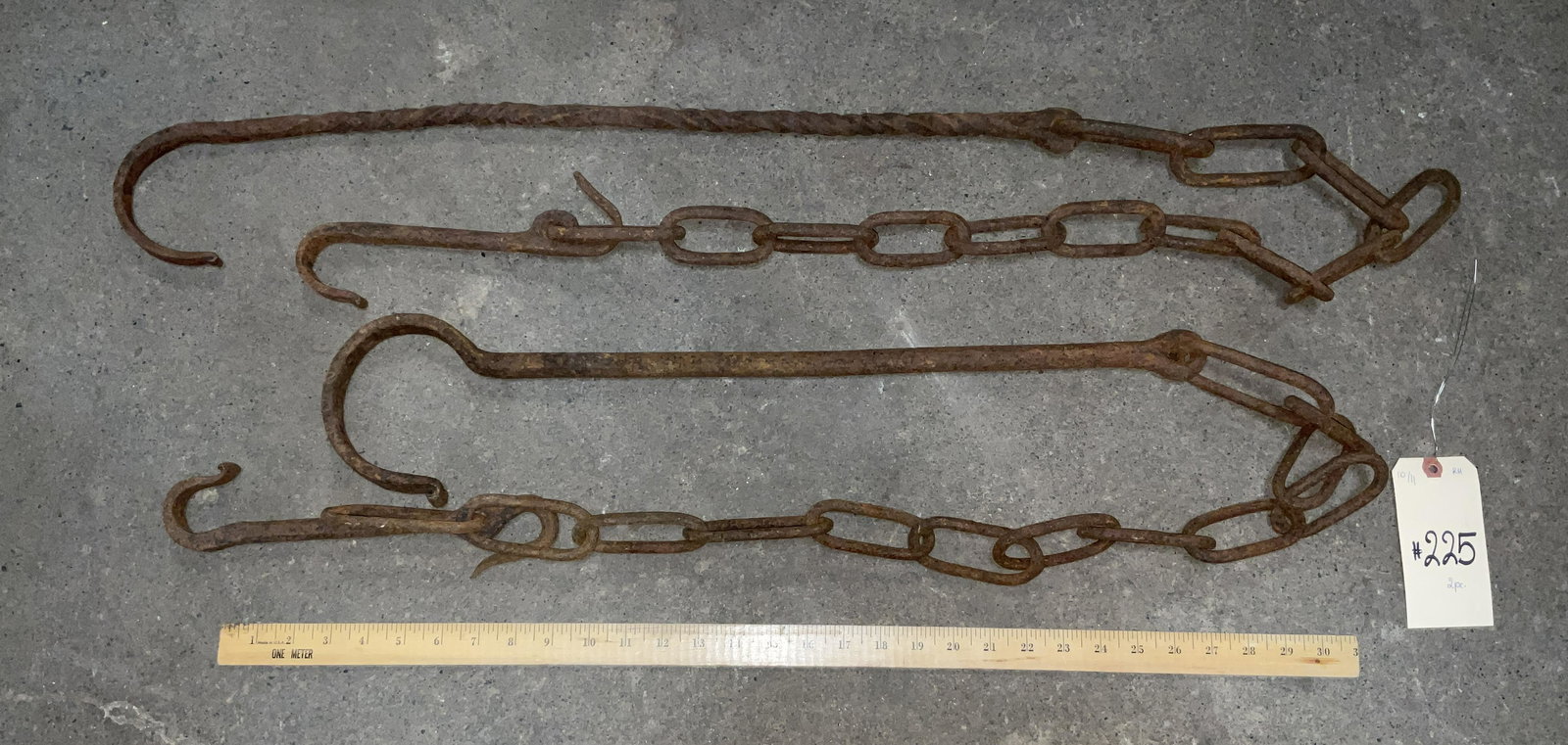 PAIR OF HAND FORGED IRON CHAIN TRAMMELS. (1 of 2)
