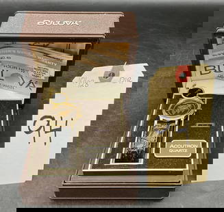 BULOVA ACCUTRON QUARTZ WATCH: A BULOVA ACCUTRON QUARTZ BUICK WATCH. COMES WITH THE OWNER'S GUIDE AND WARRANTY.