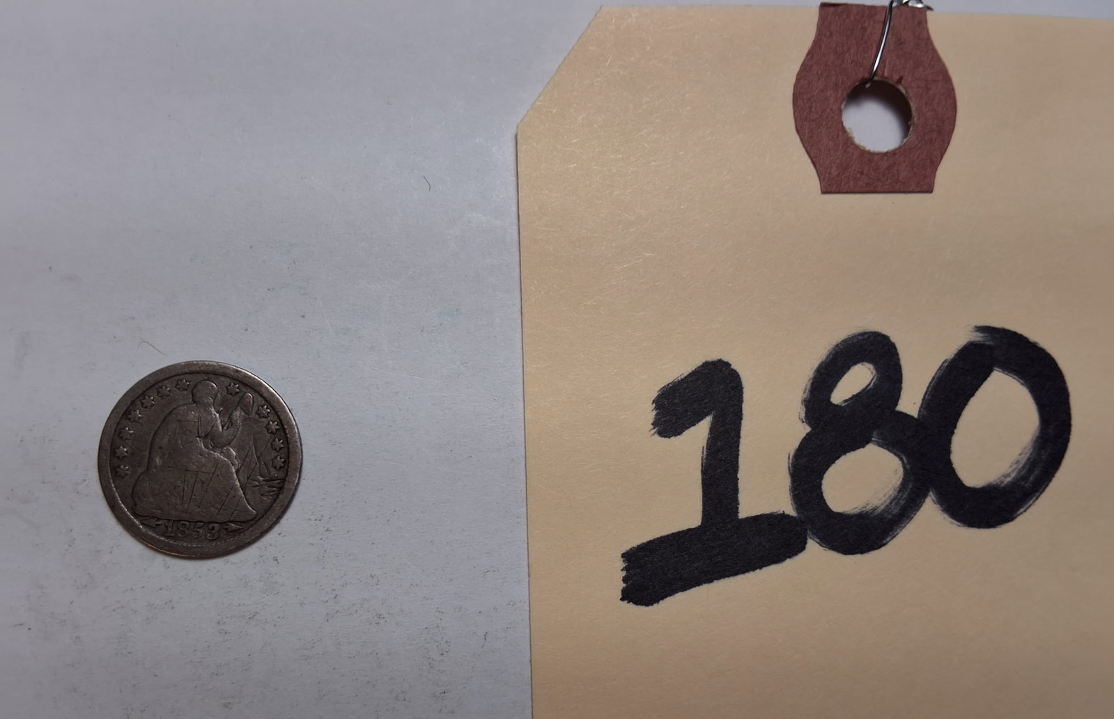 1853 Seated Half Dime 5C: 1853 Seated Half Dime 5C Condition All property is sold in "as is" condition and all sales are final. Teel Auctions and its consignor make no representations or warranties, express or implied, with re