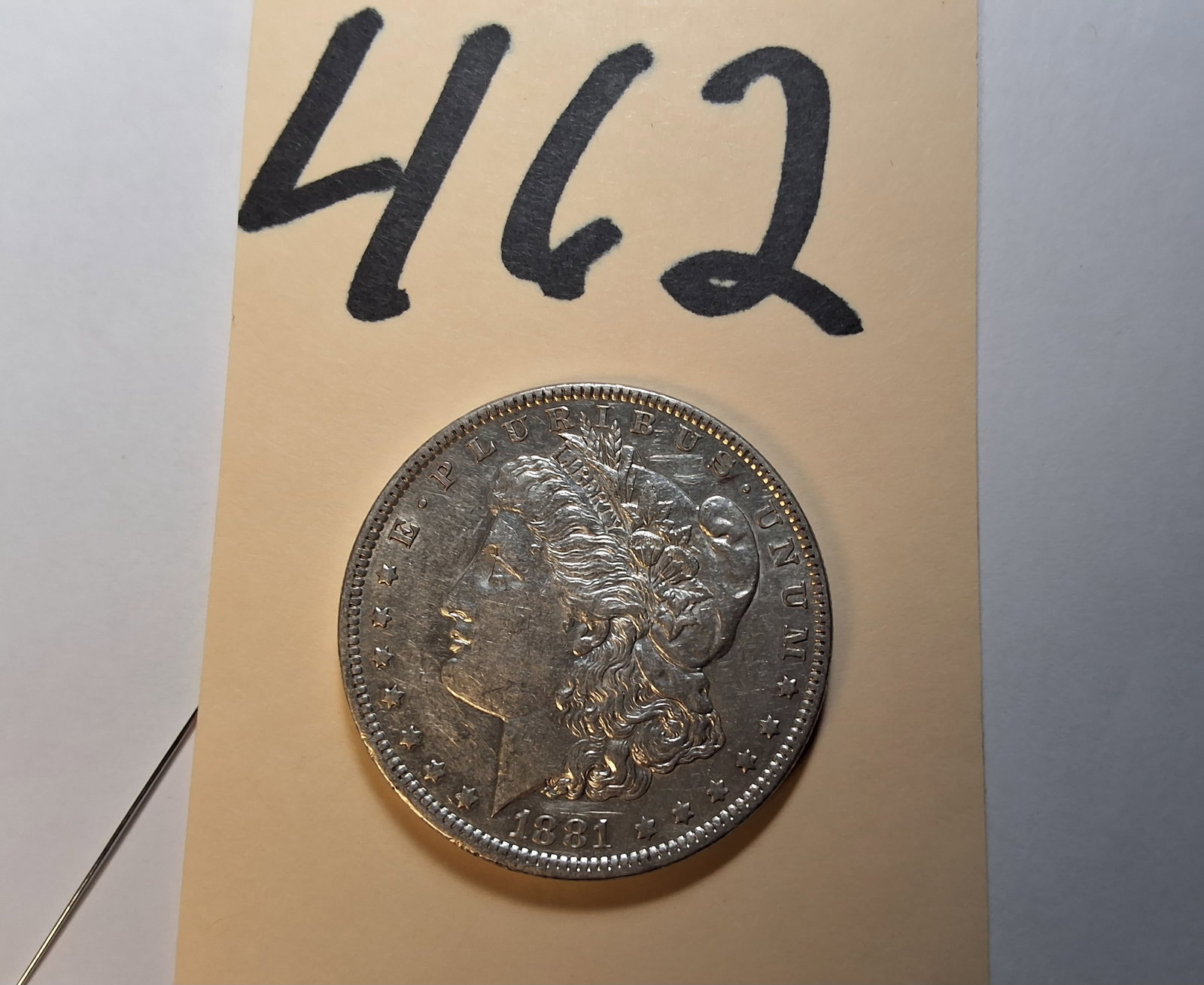 1881 O Morgan Dollar: 1881 O Morgan Dollar Condition All property is sold in "as is" condition and all sales are final. Teel Auctions and its consignor make no representations or warranties, express or implied, with respec