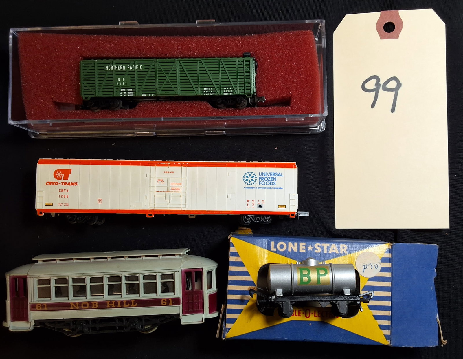 Lot of 4 Miscellaneous N Scale Train Cars: Lot of 4 Miscellaneous N Scale Train Cars Condition All property is sold in "as is" condition and all sales are final. Teel Auctions and its consignor make no representations or warranties, express or