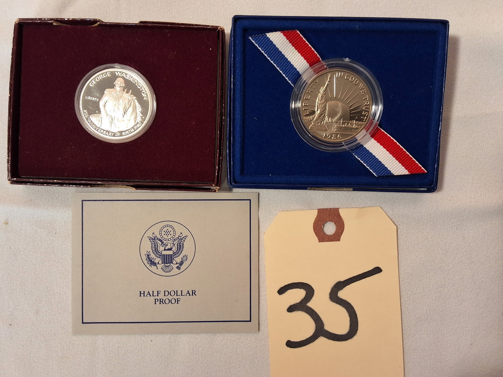 Lot of 2 Silver Commemoratives: Lot of 2 Silver Commemoratives Condition All property is sold in "as is" condition and all sales are final. Teel Auctions and its consignor make no representations or warranties, express or implied, w