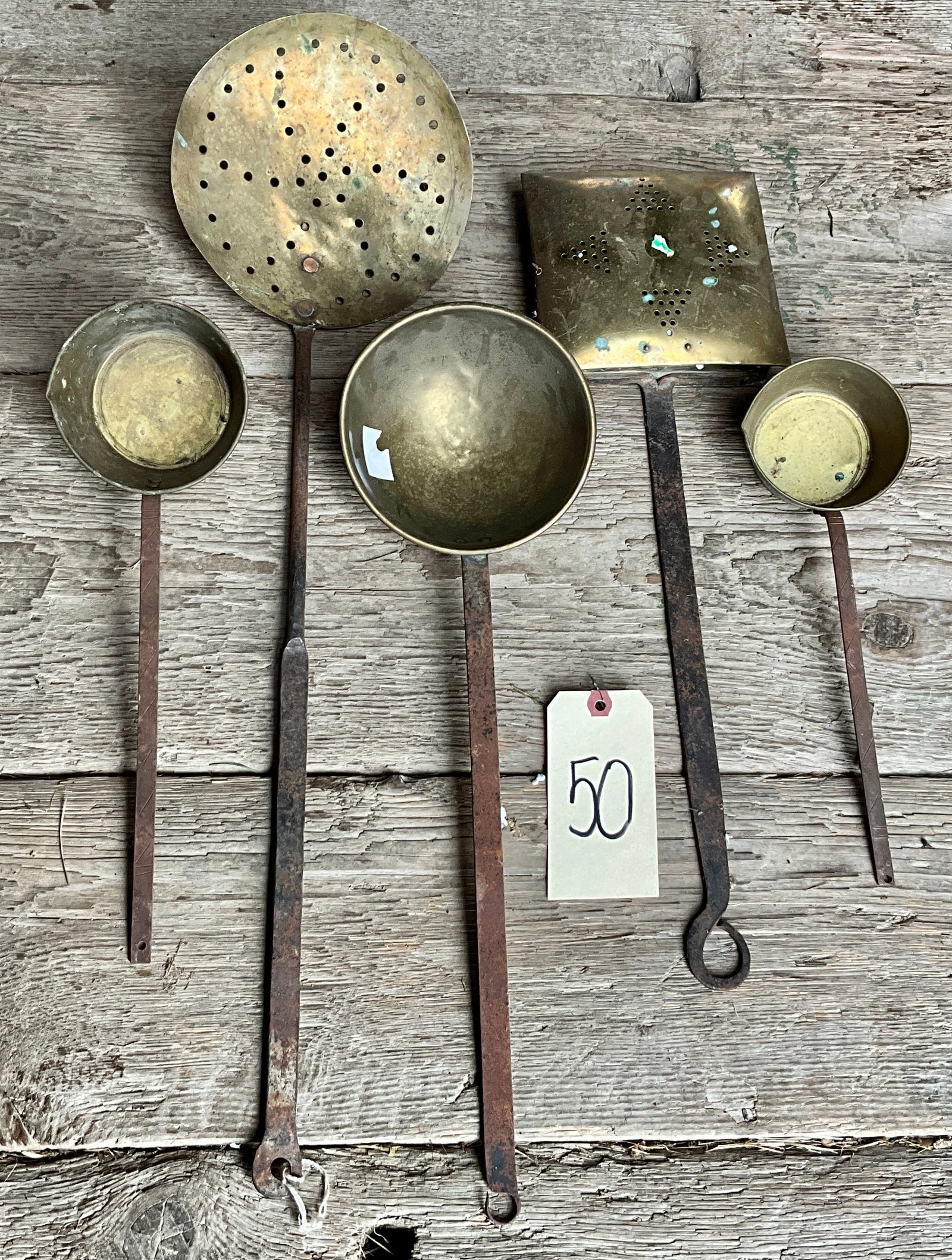 LOT OF ASSORTED BRASS AND IRON HANDLED LADLES, STRAINER, TOASTER. (1 of 2)