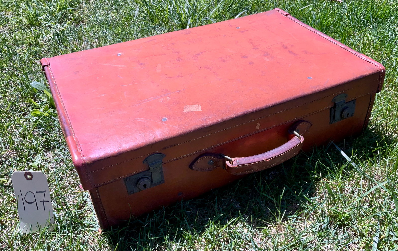 VINTAGE MARK CROSS LEATHER SUITCASE.: VINTAGE MARK CROSS LEATHER SUITCASE. MEASURES 24" X 15" X 7". Condition All property is sold in "as is" condition and all sales are final. Teel Auctions and its consignor make no representations or wa