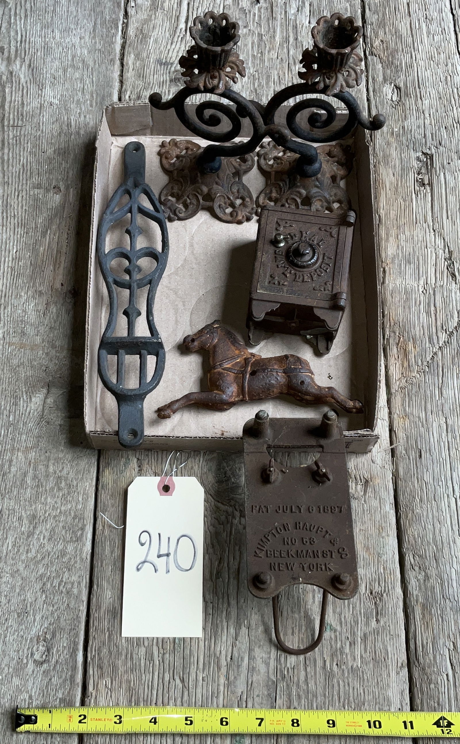 IRON CANDLESTICKS, COIN BANK, HORSE, AND MORE.: IRON CANDLESTICKS, COIN BANK, HORSE, AND MORE. Condition All property is sold in "as is" condition and all sales are final. Teel Auctions and its consignor make no representations or warranties, expre