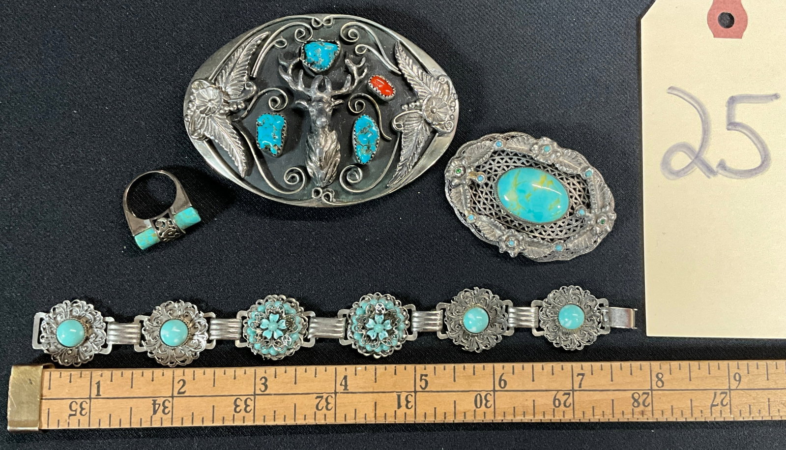 SOUTHWESTERN TURQUOISE AND CORAL RING, BELT BUCKLE, BRACELET, AND BROOCH.: SOUTHWESTERN TURQUOISE AND CORAL RING, BELT BUCKLE, BRACELET, AND BROOCH. RING IS MARKED STERLING, ALL OTHER PIECES ARE UNMARKED/UNSIGNED. Condition All property is sold in "as is" condition and all s