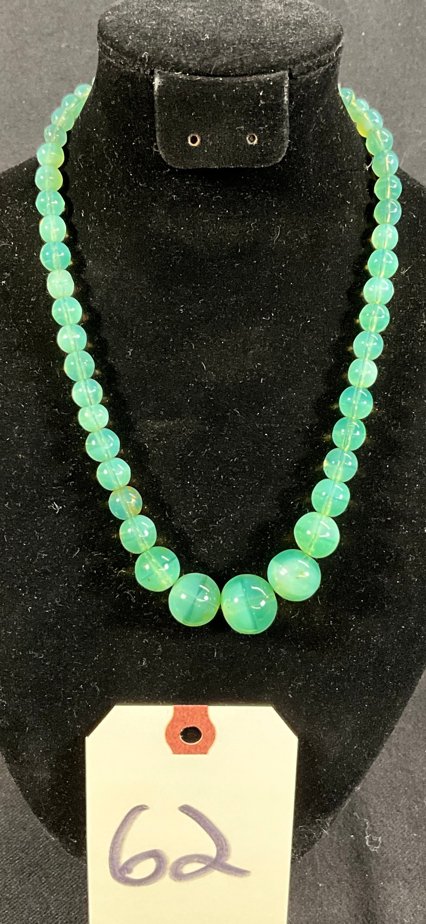 VASALINE URANIUM GLASS BEAD 16" NECKLACE.: VASALINE URANIUM GLASS BEAD 16" NECKLACE. Condition All property is sold in "as is" condition and all sales are final. Teel Auctions and its consignor make no representations or warranties, express or