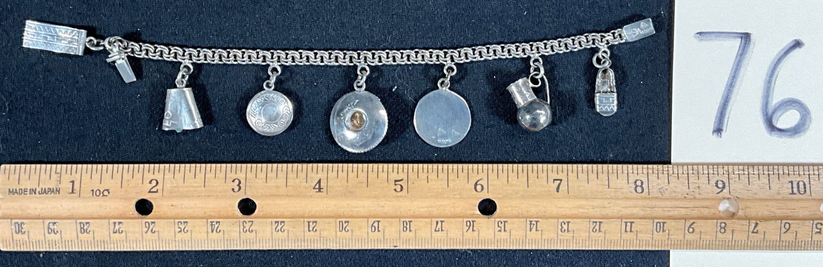 STERLING SILVER CHARM BRACELET. (1 of 4)
